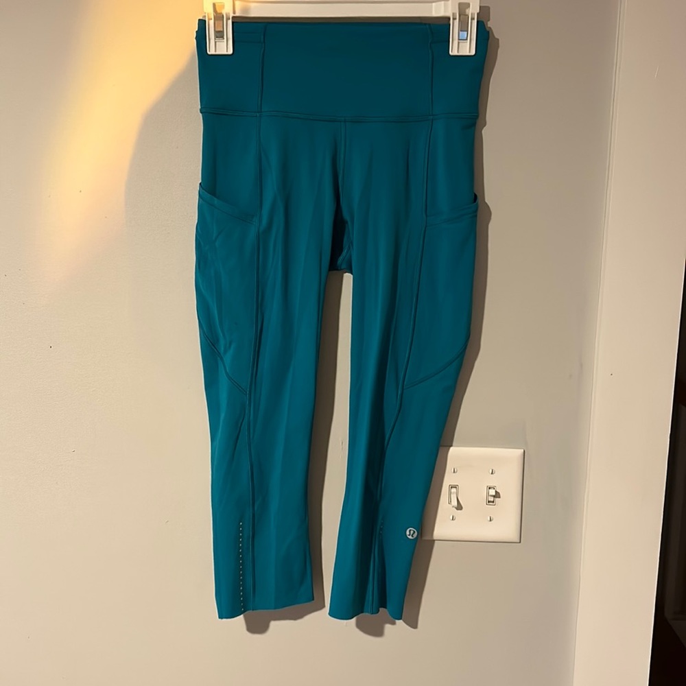 Bright teal-ish Lululemon capri leggings